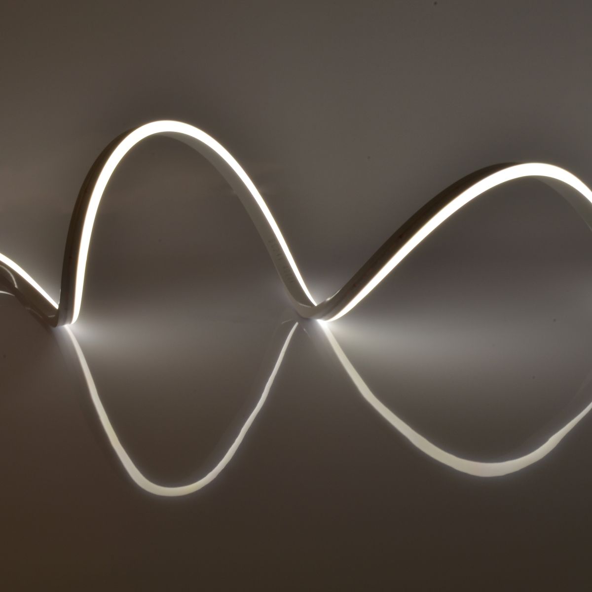 Светодиодная гибкая герметичная лента Uniel ULS-N21-2835-120LED-m-8mm-IP67-220V-8W-m-50M-4000K Uniel ULS-N21-2835-120LED/m-8mm-IP67-220V-8W/m-50M-4000K бобина UL-00013354